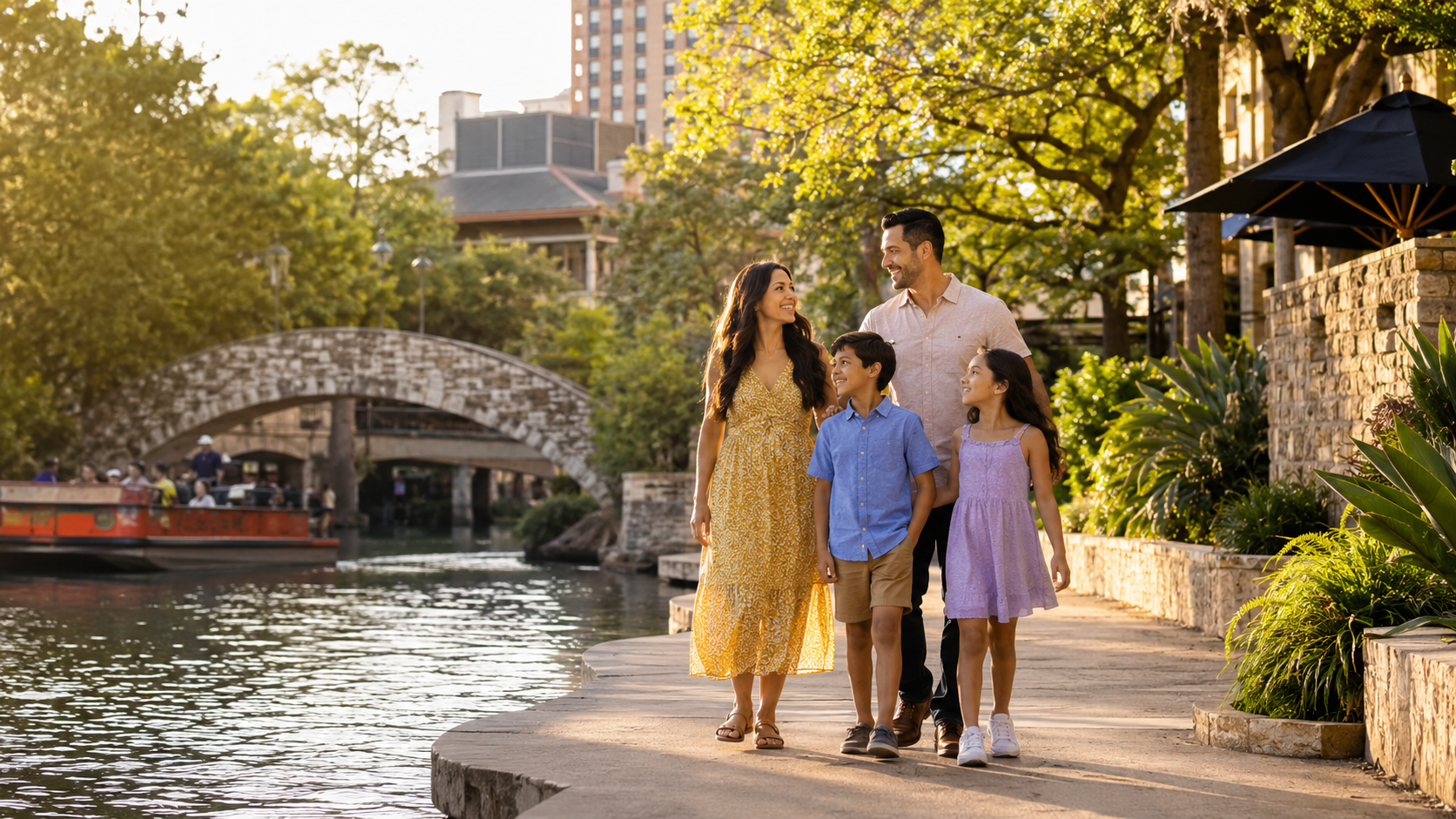 Family strolling along a canal in golden light